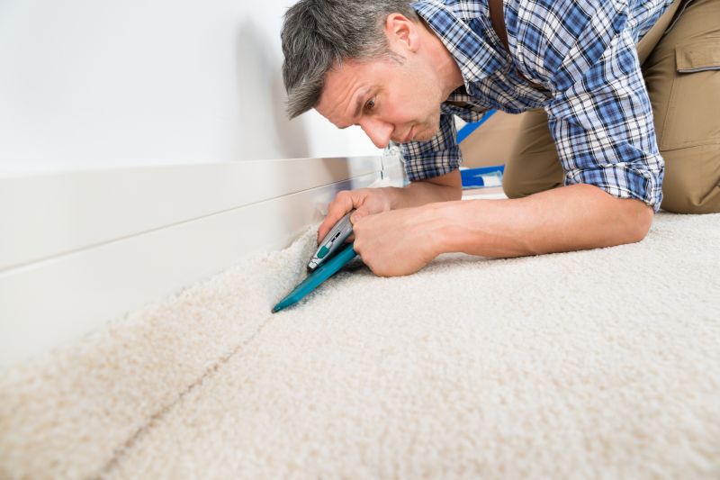 Expert Carpet Installer at Work